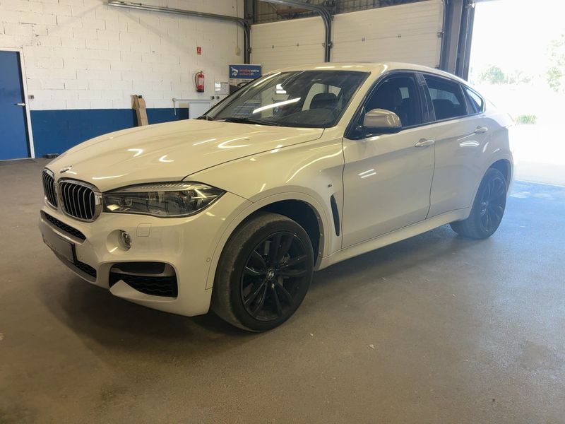 BMW X6 M50d — фото 1
