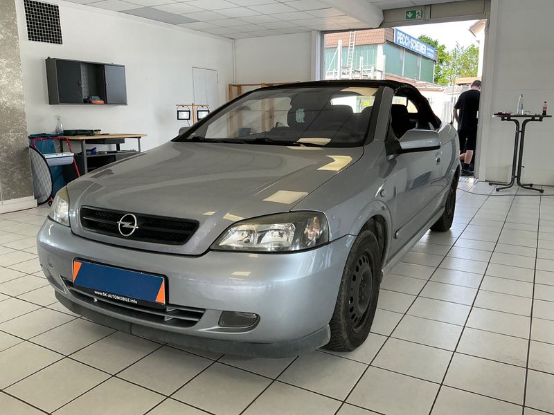 Opel Astra 1.8 — 1/8