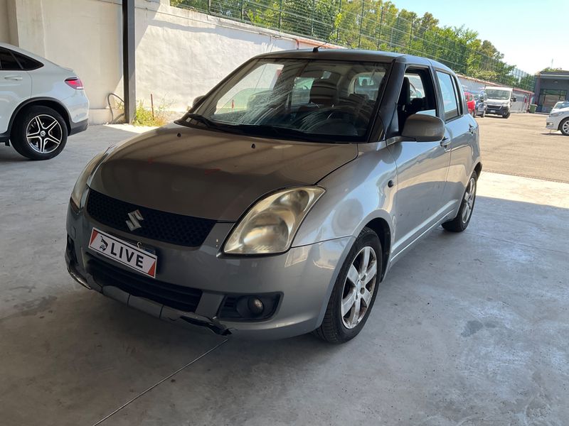 Suzuki Swift 1.3 — фото 1