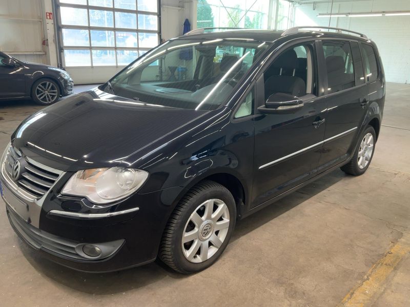 Volkswagen Touran 2.0 TDI — фото 1
