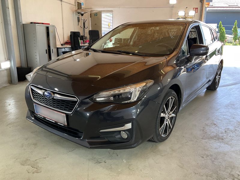 Subaru Impreza 1.6 — 1/8