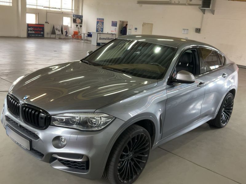 BMW X6 M50d — фото 1