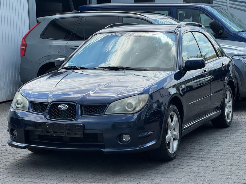 Subaru Impreza 2.0 — фото 1