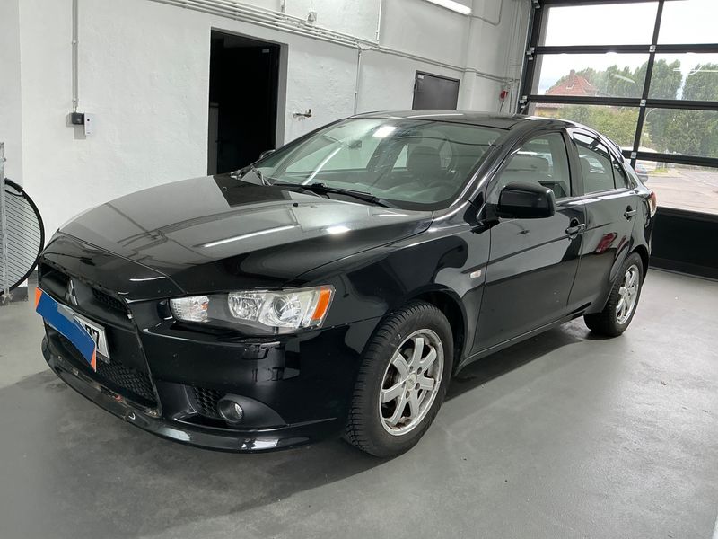 Mitsubishi Lancer 1.6 — 1/8