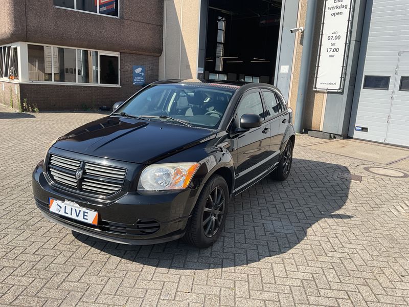 Dodge Caliber 2.0 — 1/8