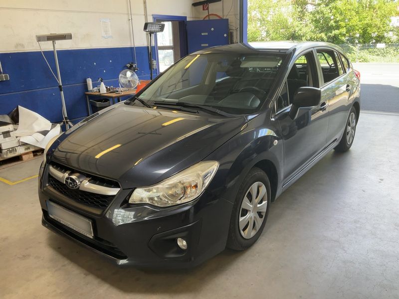 Subaru Impreza 1.6 — 1/8
