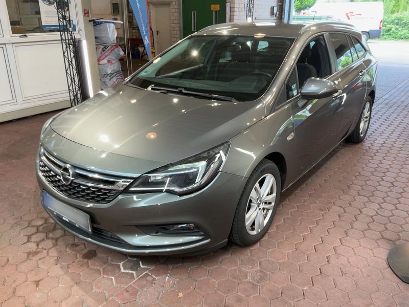 Opel Astra 1.4 SIDI Turbo — фото 1